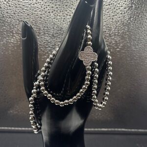 Elegant Silver Beaded Bracelet. Three Stretchy Bracelets .